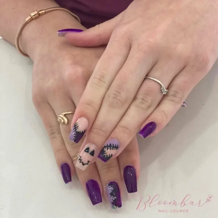 Beautiful Black and Purple Halloween Nails Design