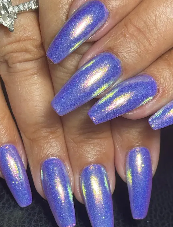 Light blue chrome nails with a hint of purple
