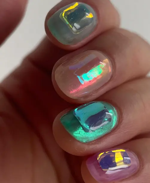 Aurora pastel nails with gems
