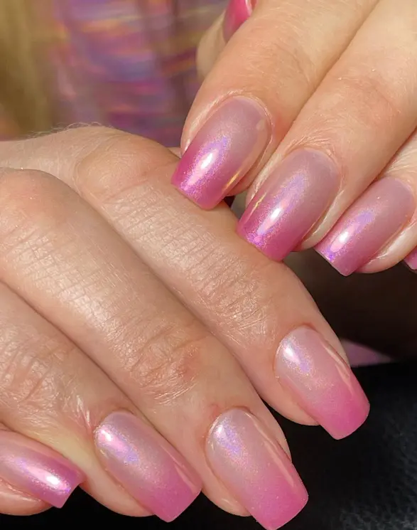 Pretty ombre pink nails with chrome powder finish
