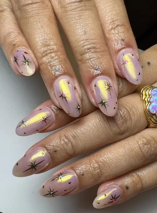 Rose gold round nails with twinkle stars
