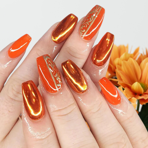 Orange chrome nails