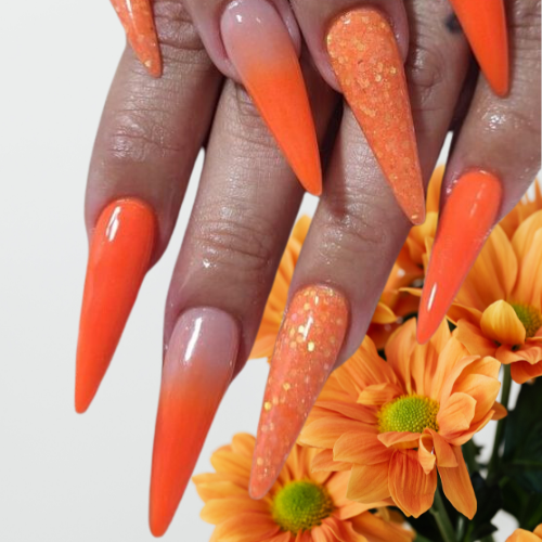 Orange chrome nails