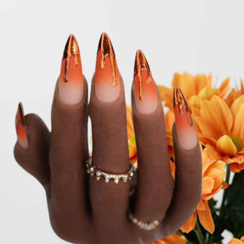 Orange chrome nails