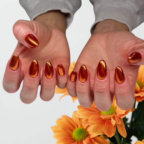 Orange chrome nails