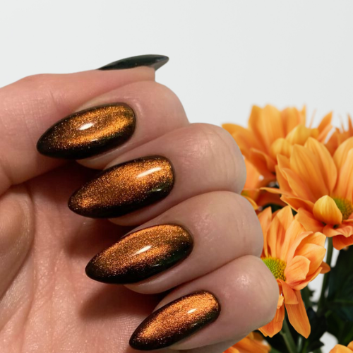 Orange chrome nails