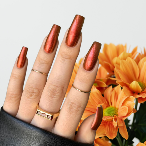 Orange chrome nails