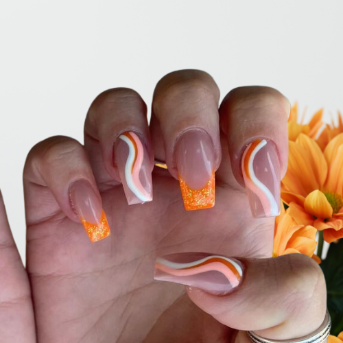 Orange chrome nails