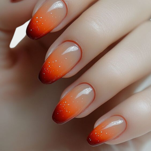 Orange chrome nails